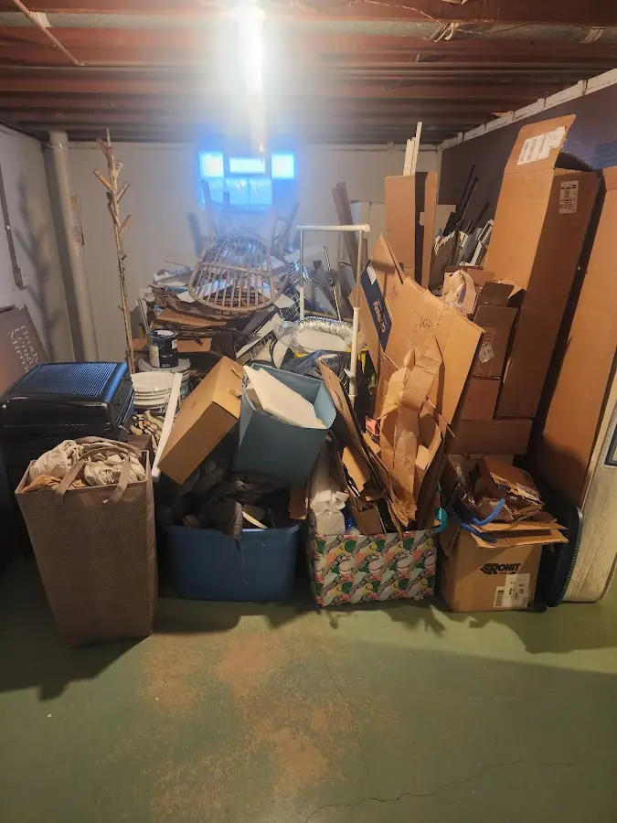 Roll-off dumpster container at job site for 2 Yard Dumpster Rental in Roslyn